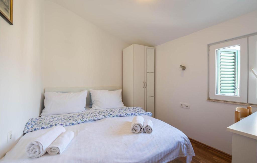 Posteľ alebo postele v izbe v ubytovaní Beautiful Home In Split With Kitchen