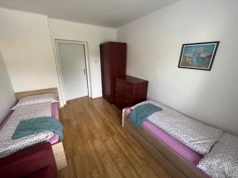 Postel nebo postele na pokoji v ubytování Domeček Mireček