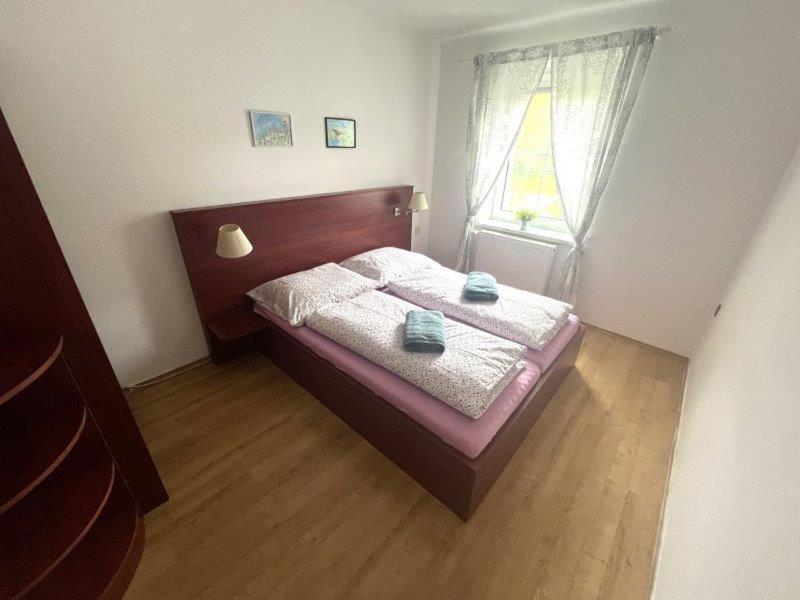 Postel nebo postele na pokoji v ubytování Domeček Mireček