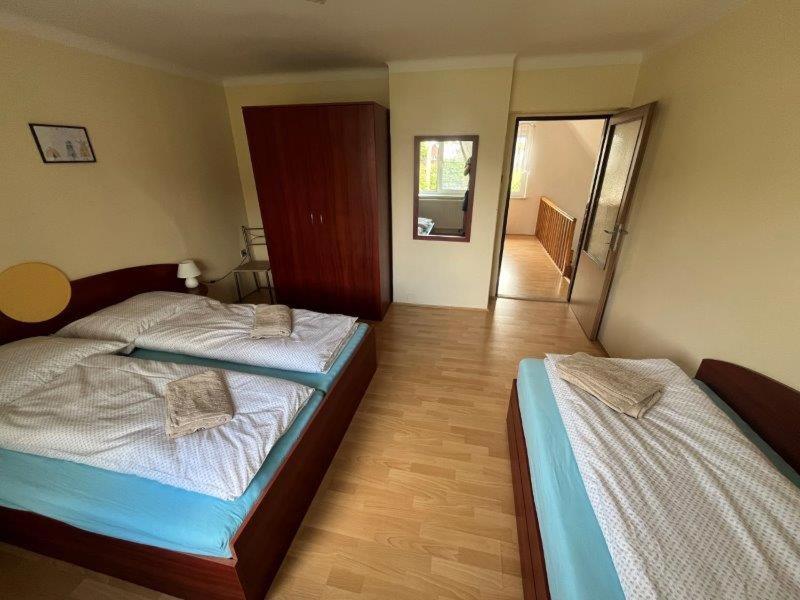 Postel nebo postele na pokoji v ubytování Domeček Mireček