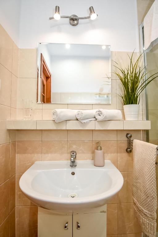 Kúpeľňa v ubytovaní Apartament w Alejce