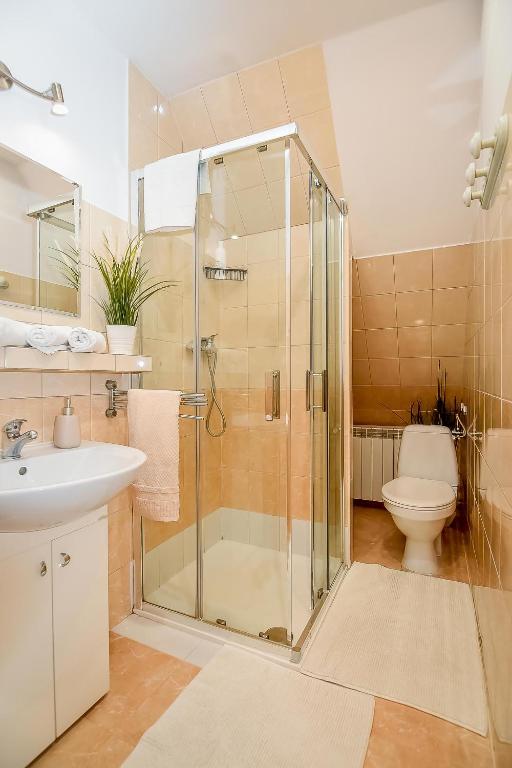 Kúpeľňa v ubytovaní Apartament w Alejce
