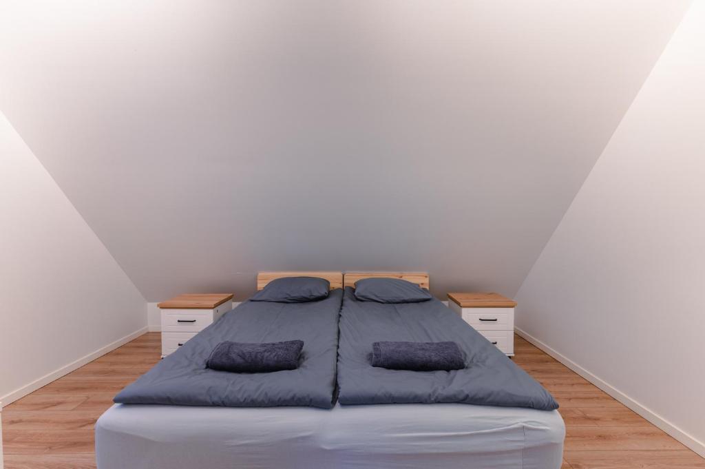 Voodi või voodid majutusasutuse Posti Guesthouse toas