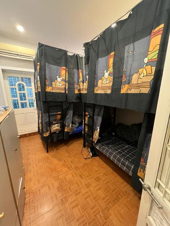Postel nebo postele na pokoji v ubytování Hanoifriends