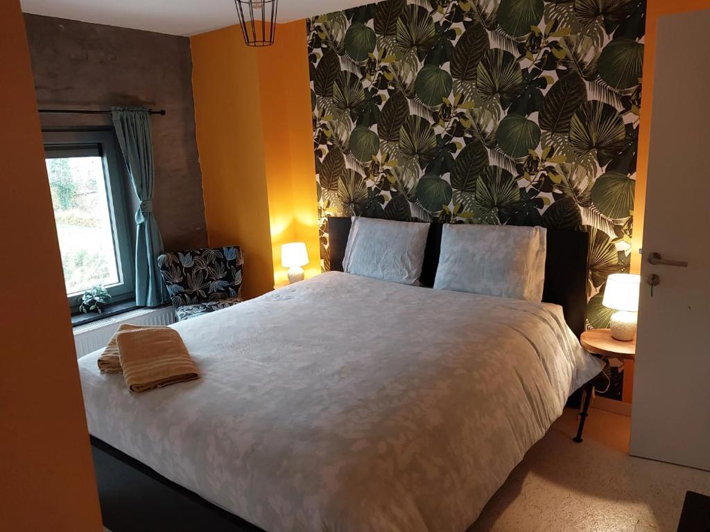 Postel nebo postele na pokoji v ubytování Gîte Le Salmon