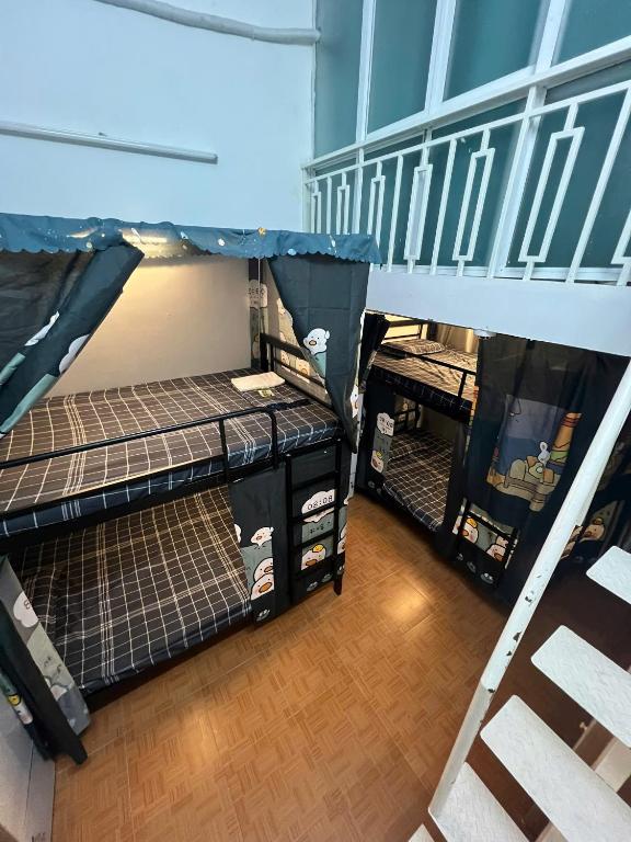 Postel nebo postele na pokoji v ubytování Hanoifriends
