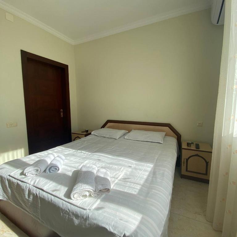 Postel nebo postele na pokoji v ubytování Guest House Deme