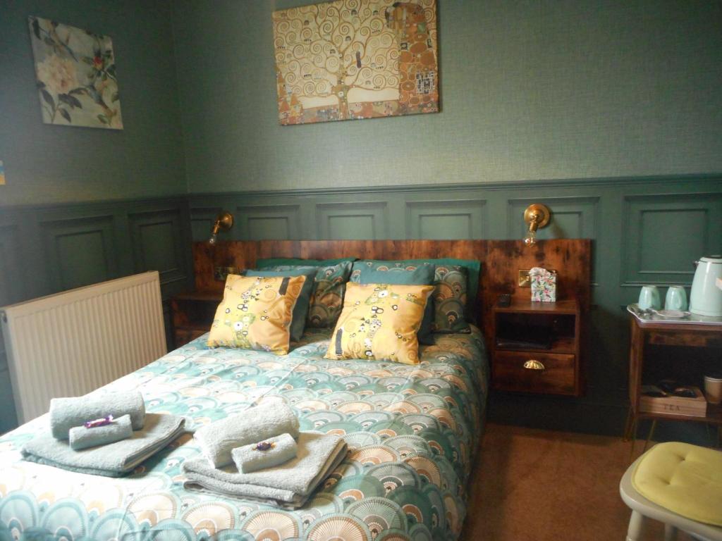 Postel nebo postele na pokoji v ubytování The George B & B