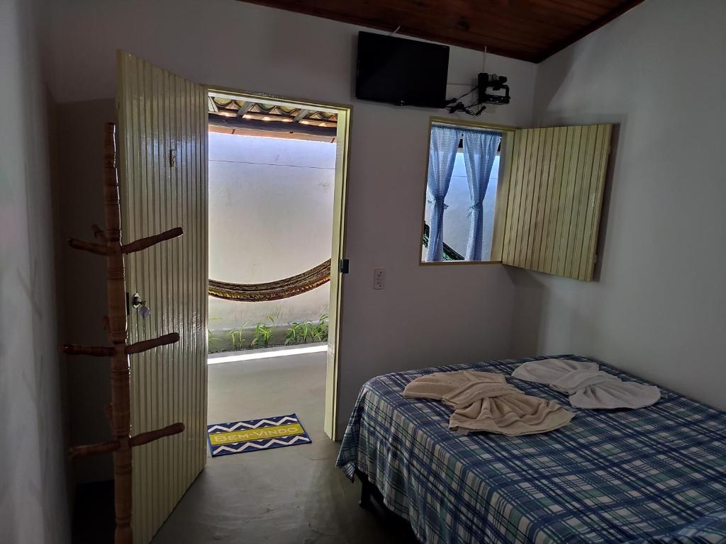 Postel nebo postele na pokoji v ubytování Pousada Lua Mar Arraial d'Ajuda