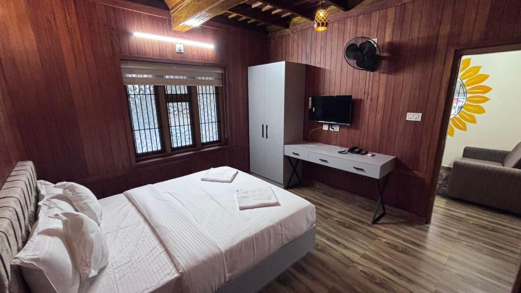 TV a/nebo společenská místnost v ubytování Tropical Blue Resort