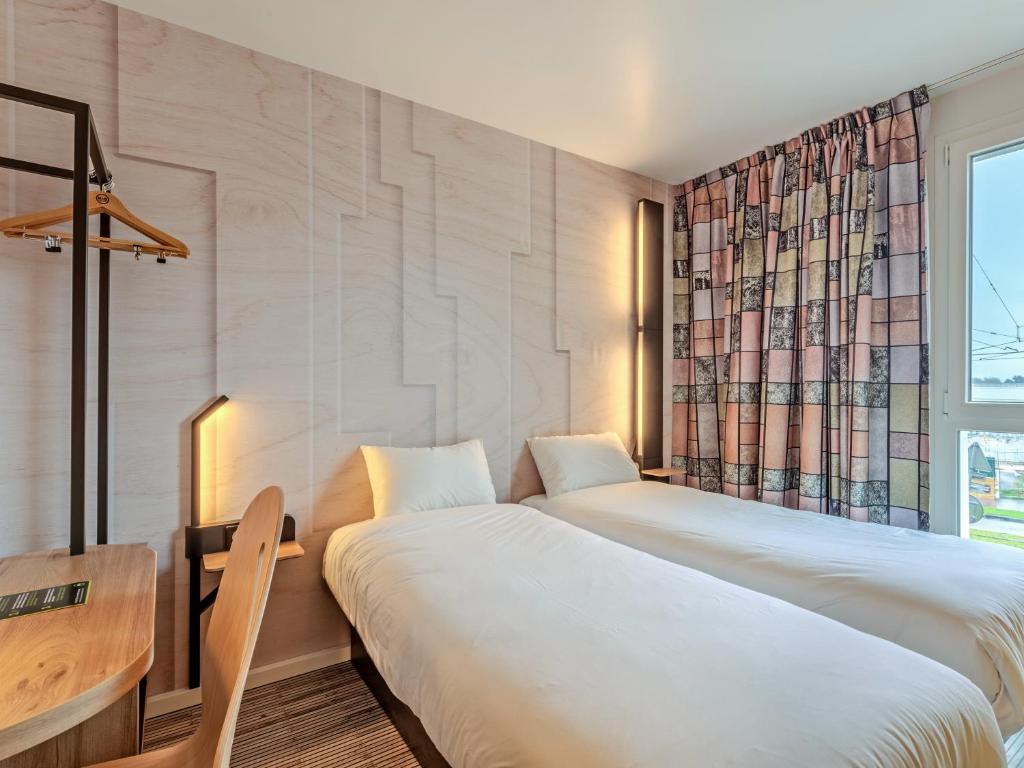 Postel nebo postele na pokoji v ubytování B&B HOTEL Brest Porte de Gouesnou