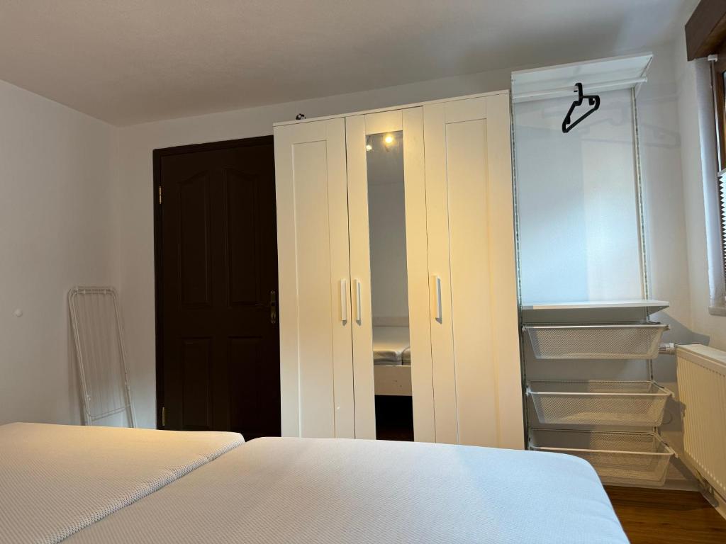 Postel nebo postele na pokoji v ubytování 2 Zimmer Apartment mit kostenlosem Parkplatz