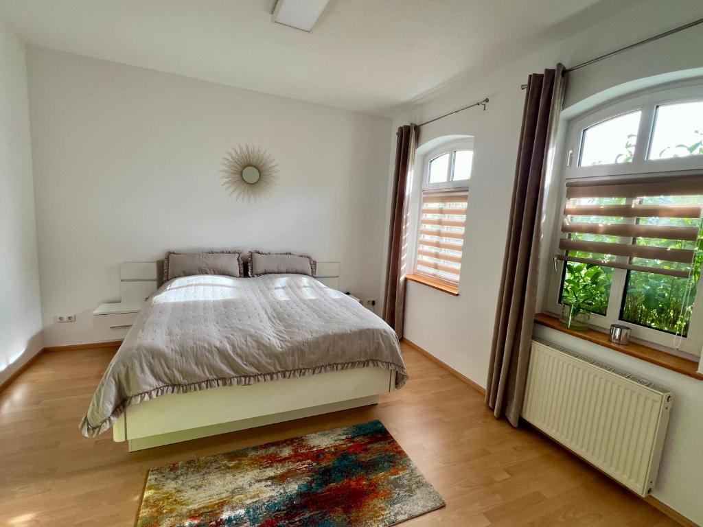 Postel nebo postele na pokoji v ubytování Villa Kayser