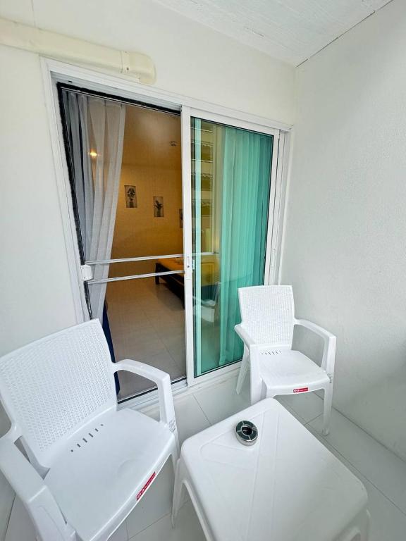 Posezení v ubytování Pupa Rooms