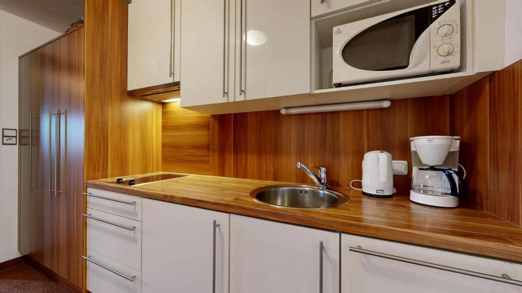 Kuchyň nebo kuchyňský kout v ubytování Landhaus Foidl