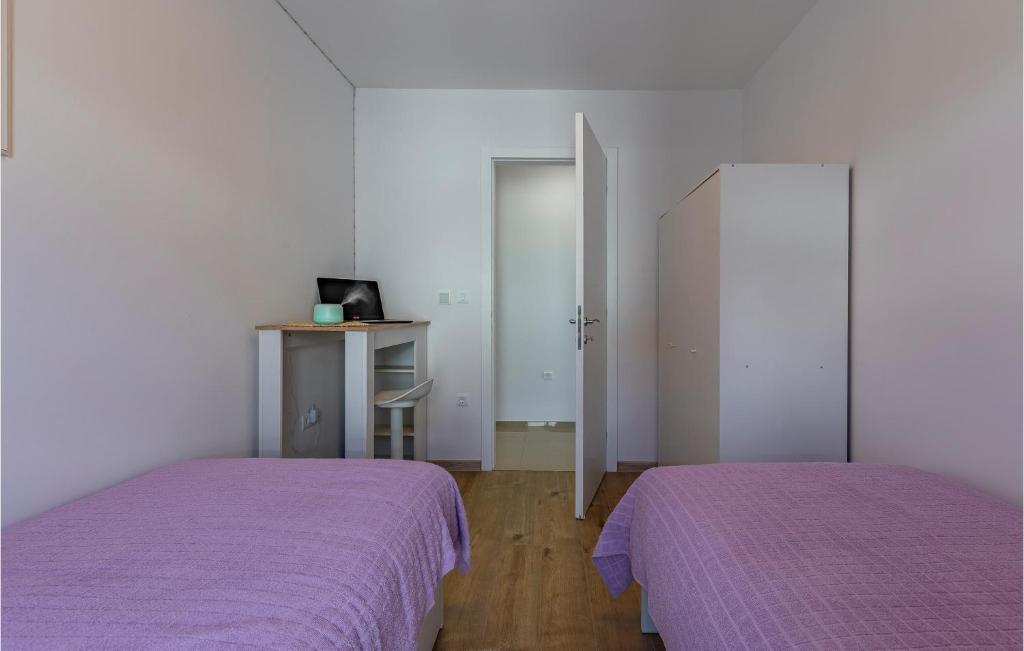 Posteľ alebo postele v izbe v ubytovaní Lovely Apartment In Banjole