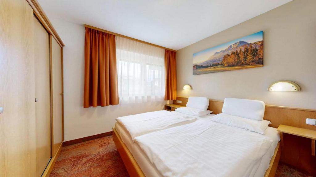 Postel nebo postele na pokoji v ubytování Landhaus Foidl