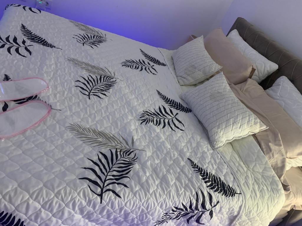 Postel nebo postele na pokoji v ubytování Petra Apartments