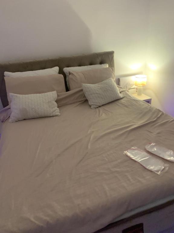 Postel nebo postele na pokoji v ubytování Petra Apartments