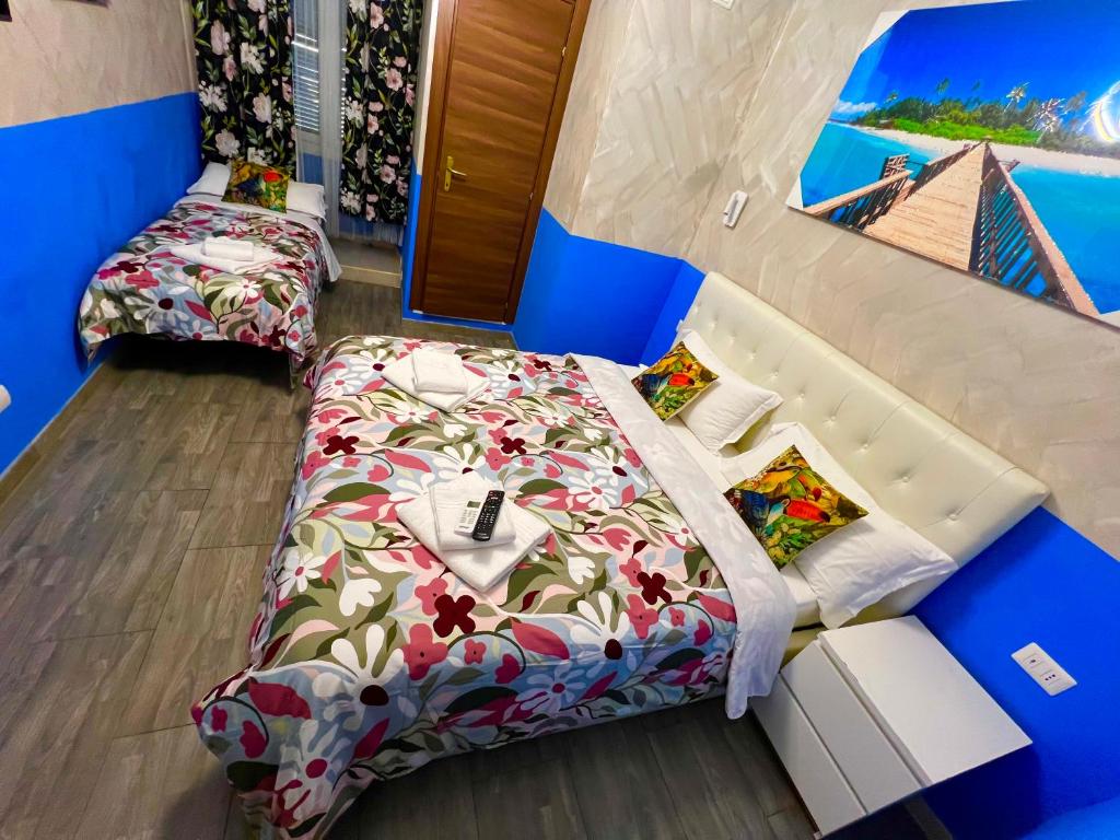 Posteľ alebo postele v izbe v ubytovaní Relaxon Guest House