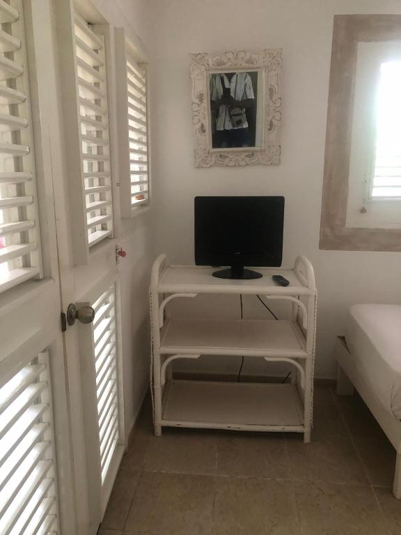 TV a/nebo společenská místnost v ubytování Hotel Casa Robinson