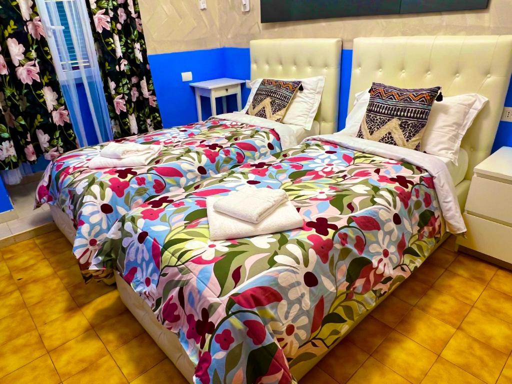 Posteľ alebo postele v izbe v ubytovaní Relaxon Guest House