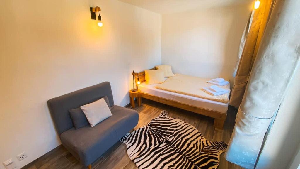 Postel nebo postele na pokoji v ubytování Apartment Olsa - Cozy Studio in Kandersteg