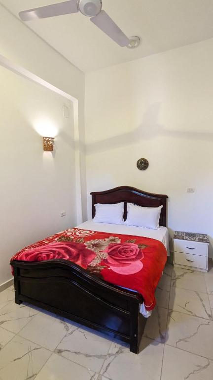 Postel nebo postele na pokoji v ubytování Yasmine Guest House