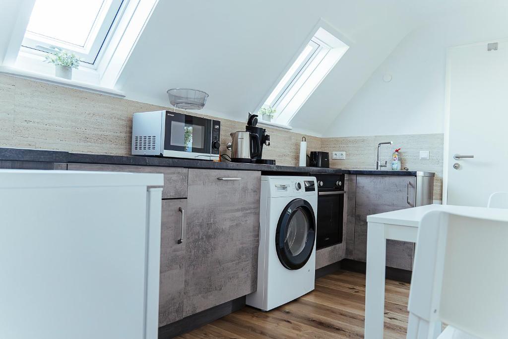 Kuchyň nebo kuchyňský kout v ubytování Proud-Apartments Gießen
