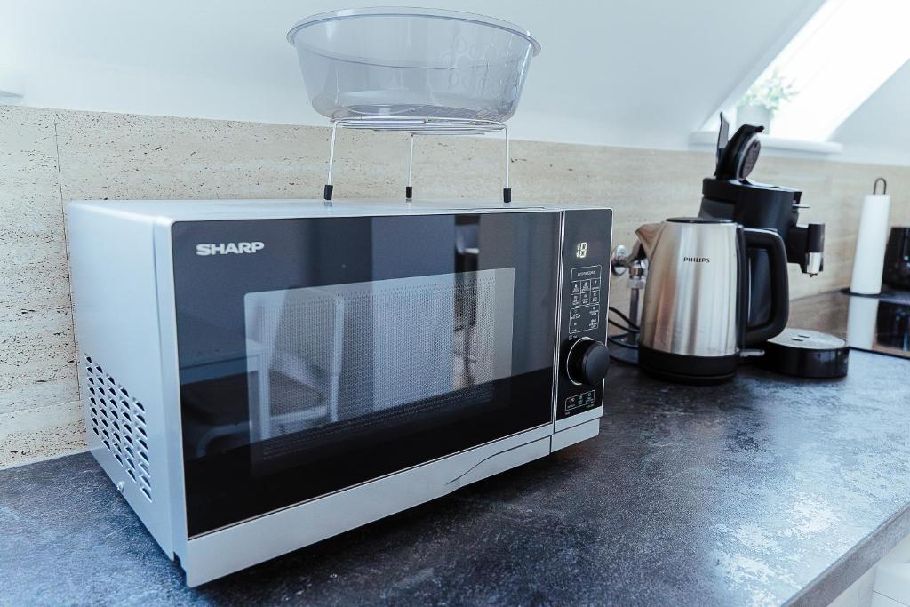 Kuchyň nebo kuchyňský kout v ubytování Proud-Apartments Gießen
