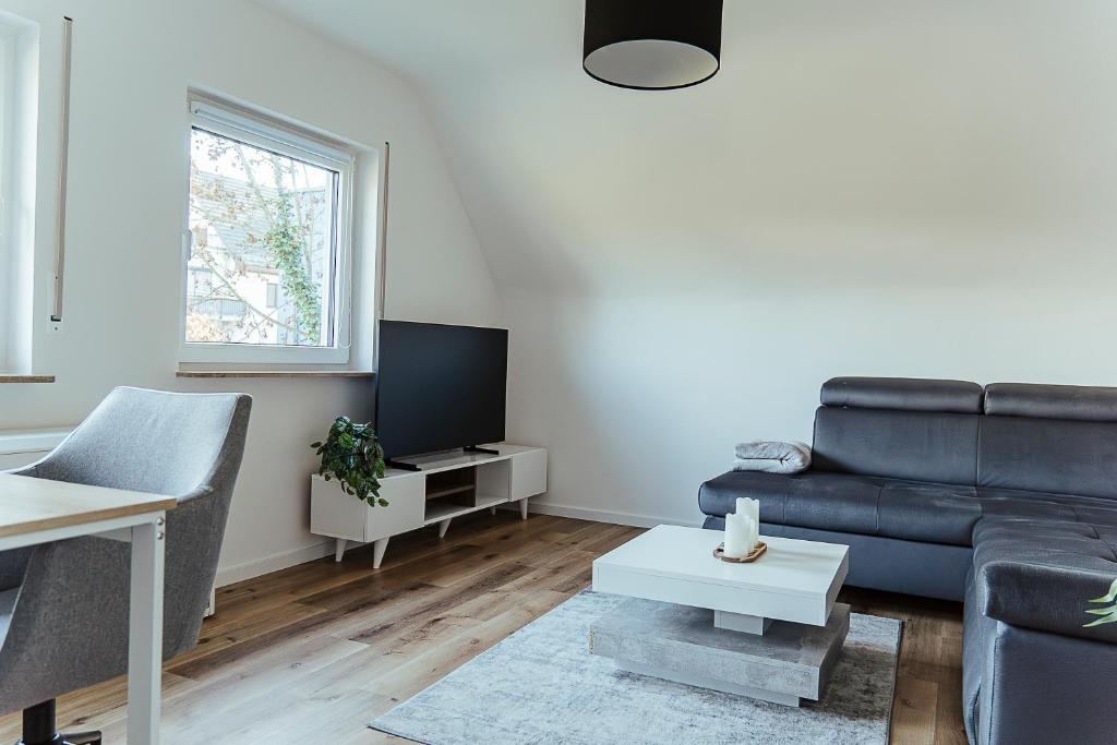 Posezení v ubytování Proud-Apartments Gießen