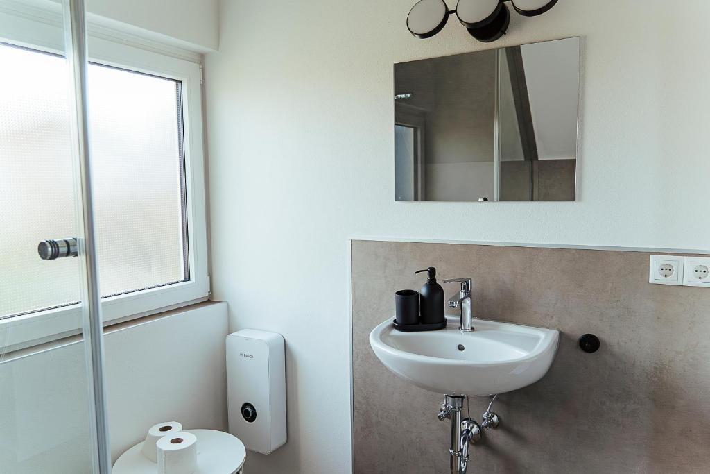 Koupelna v ubytování Proud-Apartments Gießen