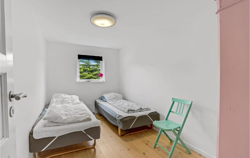 Postel nebo postele na pokoji v ubytování Holiday Home Krondyrstien Væggerløse Ii