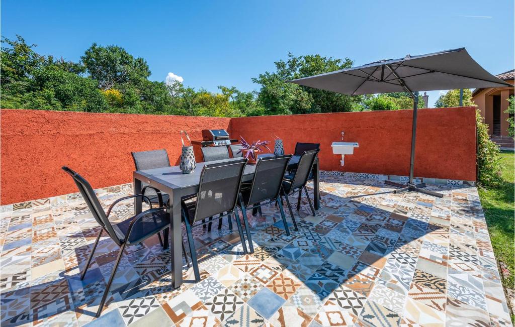 A patio or other outdoor area at 3 Bedroom Awesome Home In Liznjan