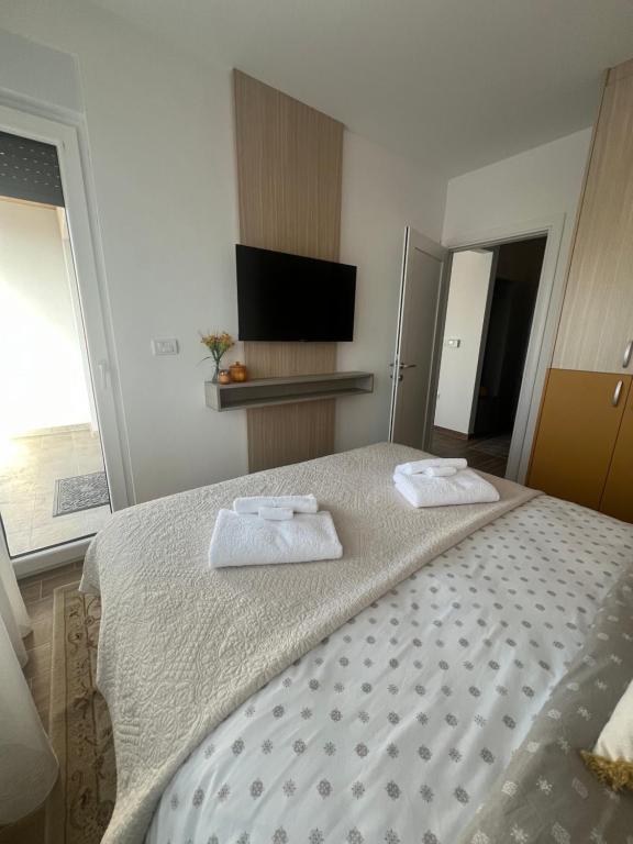 Postel nebo postele na pokoji v ubytování Marshall Apartments - Zlatibor