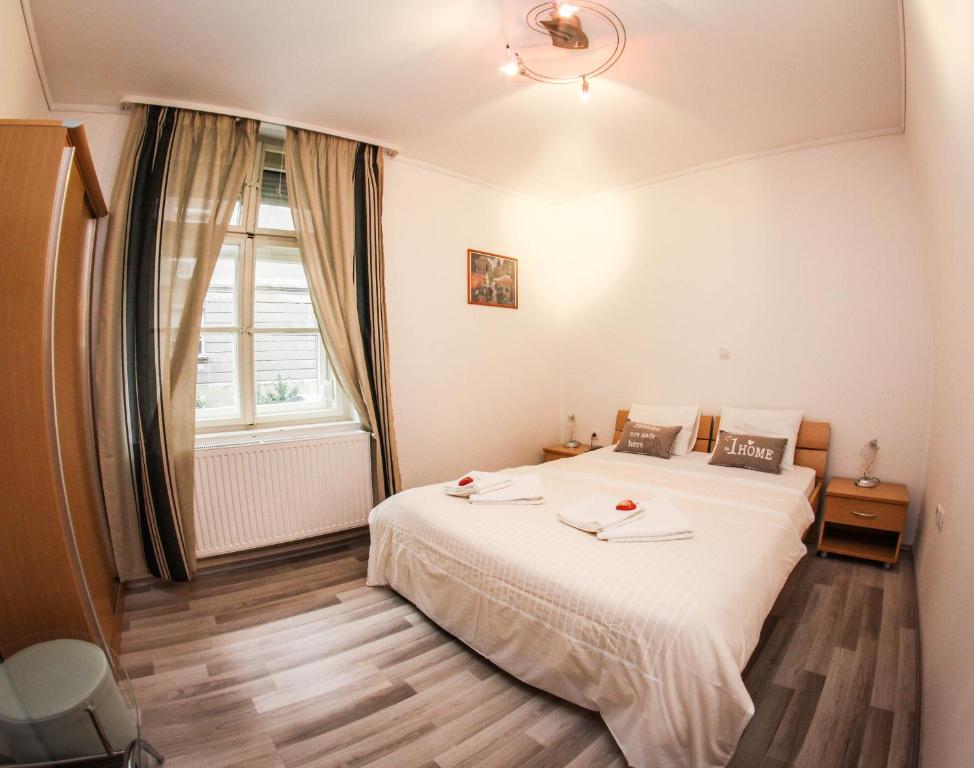 Posteľ alebo postele v izbe v ubytovaní Rooms Eliza