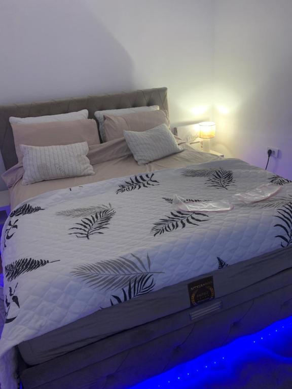 Postel nebo postele na pokoji v ubytování Petra Apartments