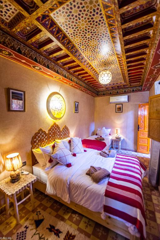 Postel nebo postele na pokoji v ubytování Riad Almonds Marrakech