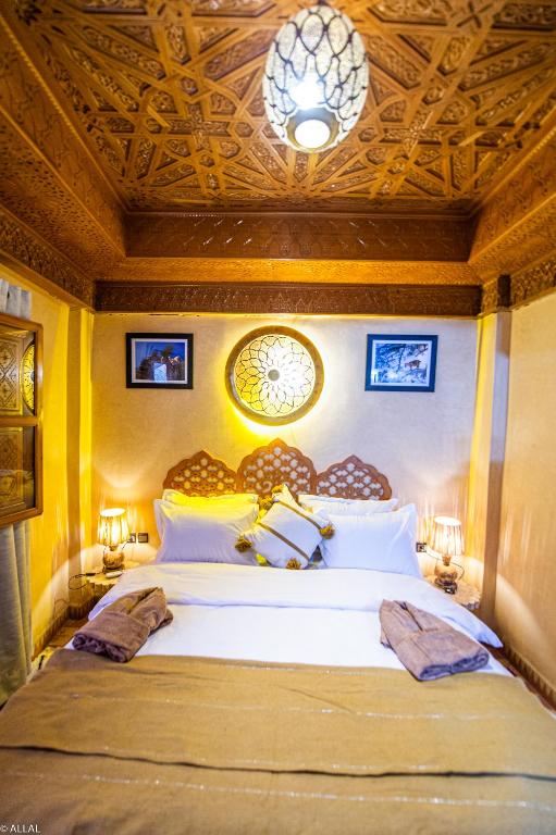 Postel nebo postele na pokoji v ubytování Riad Almonds Marrakech
