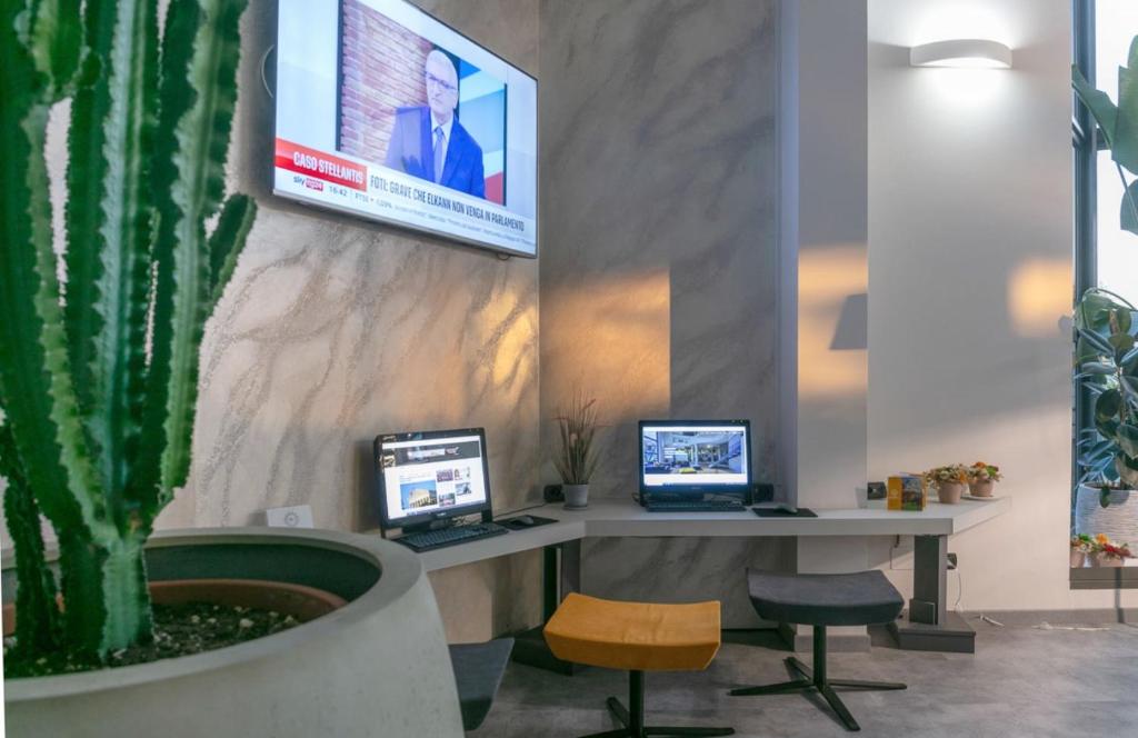 TV a/nebo společenská místnost v ubytování Break Hotel