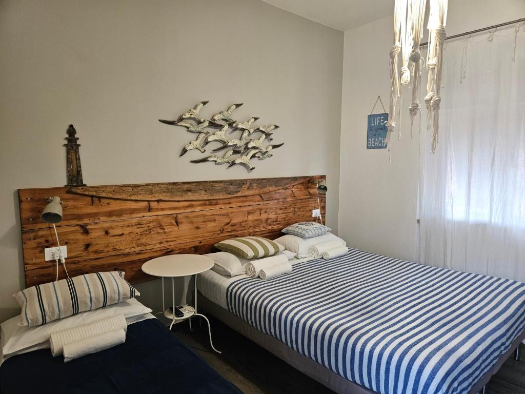 Кровать или кровати в номере VILLA VILLACOLLE