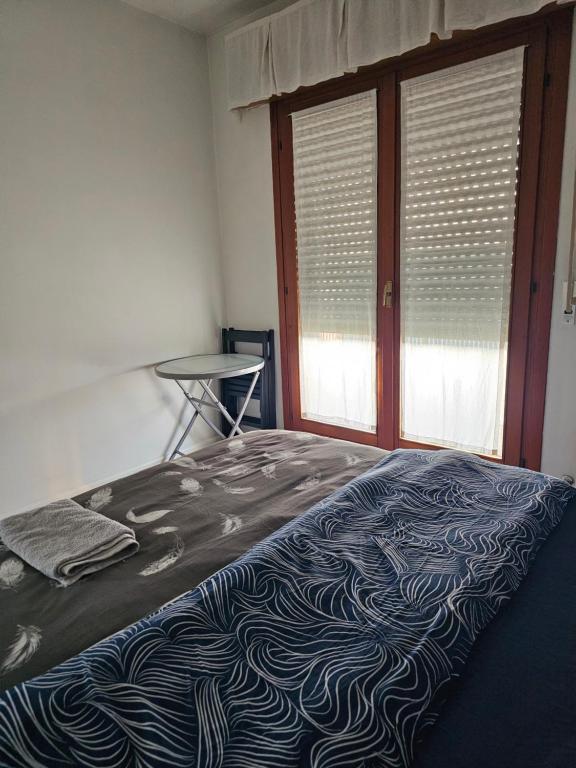 Postel nebo postele na pokoji v ubytování Casa GopNa