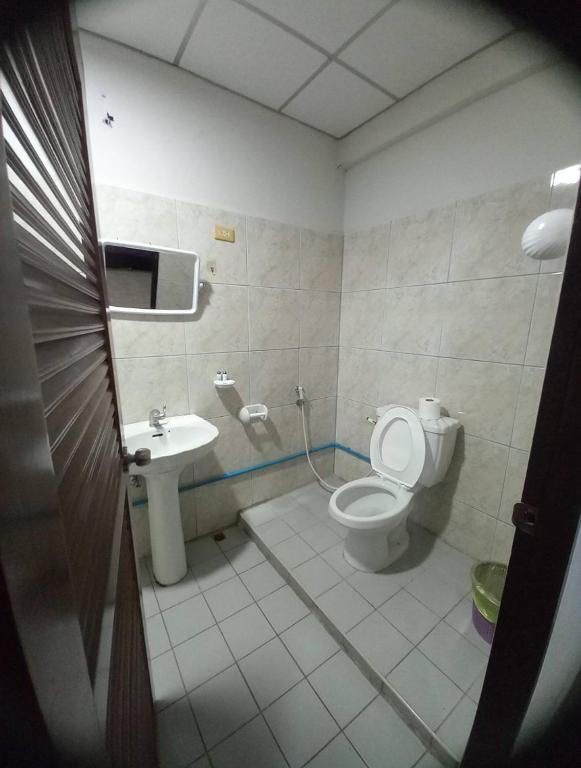 Koupelna v ubytování PLUEMCHAI Guesthouse