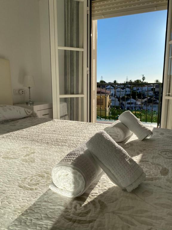 Postel nebo postele na pokoji v ubytování Apartamento con vistas