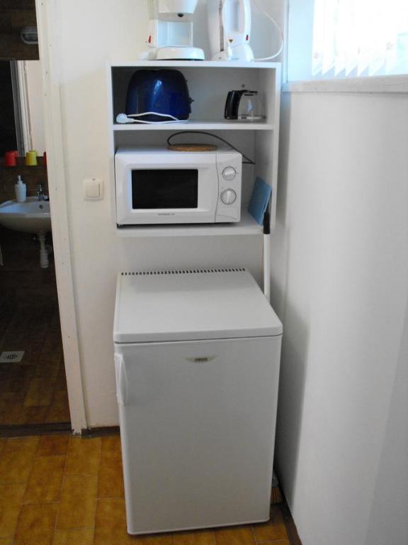 Kuchyň nebo kuchyňský kout v ubytování Siesta Üdülő