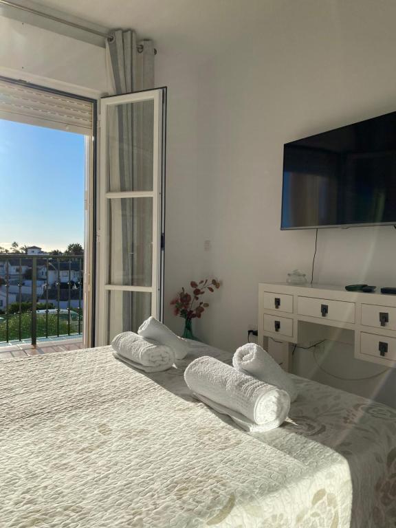 Postel nebo postele na pokoji v ubytování Apartamento con vistas