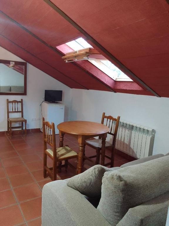 TV a/nebo společenská místnost v ubytování Hotel San Julian
