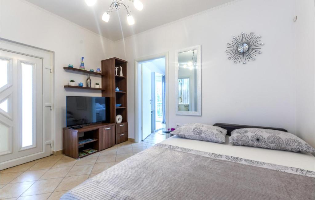 Posteľ alebo postele v izbe v ubytovaní Apartment Raduniceva I