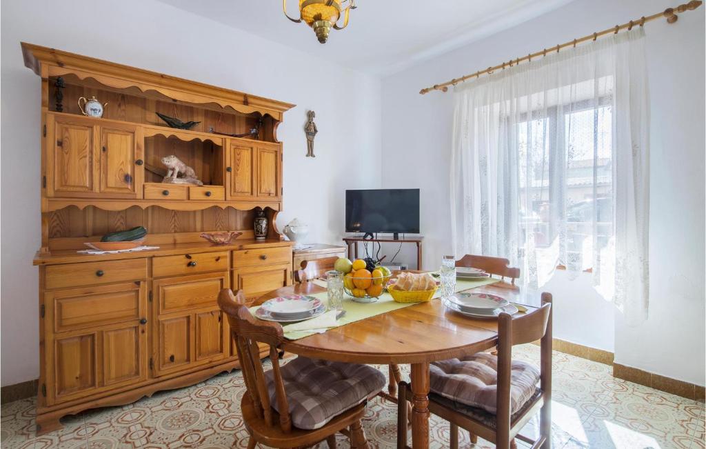 Televízia a/alebo spoločenská miestnosť v ubytovaní Apartment Valtura 13