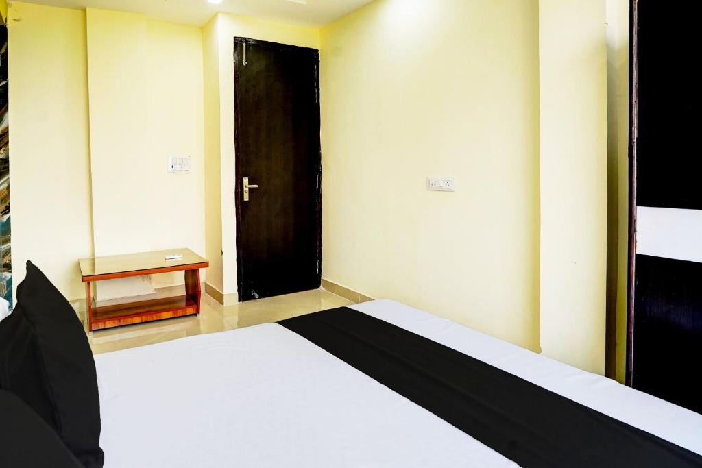 Postel nebo postele na pokoji v ubytování Super Hotel O Varn Residency And Hotels